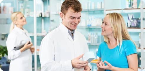 pharmacist assisting his customer